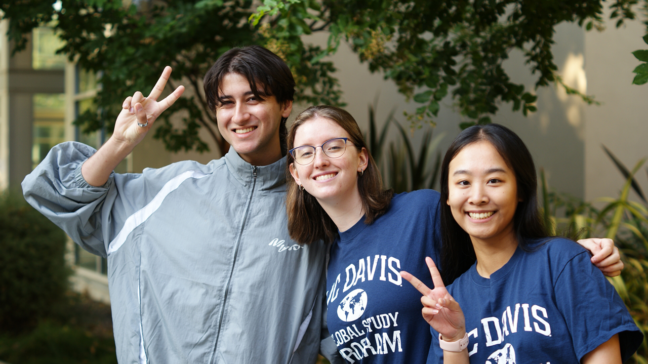 Three UC Davis Global Study Program students pose at the fall 2023 orientation