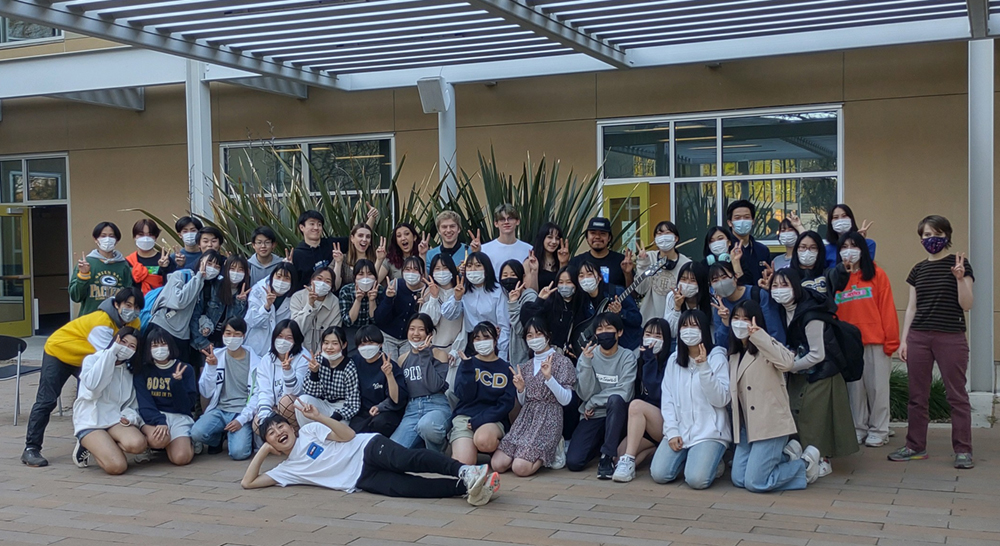 visiting high school students from Japan pose outside UC Davis International Center