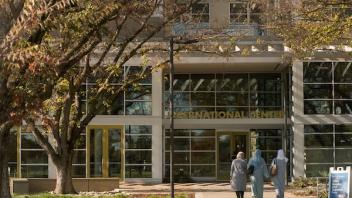 Students walking into the International Center