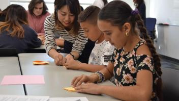 Students during an origami activity