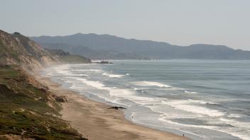 The California coast with waves crash onto Ocean Beach in San Francisco 