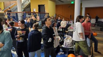 students at the bowling alley in the Memorial Union on campus