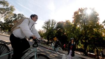 Students ride through the bike circle as they ride across campus