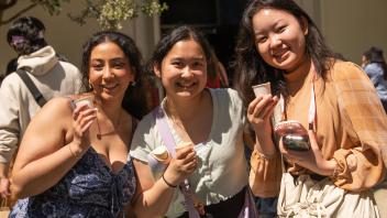 UC Davis Picnic Day students pose with ice cream from Nitrogen ice cream making event