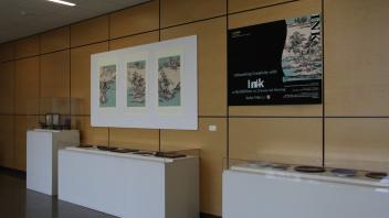 YiFei Li's artwork displayed in the International Center lobby
