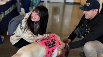 Academic Engagement Track students meet one of UC Davis' support dogs