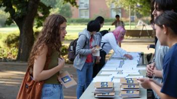 A UC Davis GSP student gets information while checking in for fall orientation
