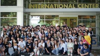 Fall 2023 GSP students pose for a group photo outside the UC Davis International Center