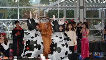 UC Davis International students pose in their Halloween costumes