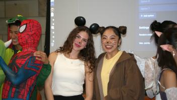 UC Davis International students pose in their Halloween costumes