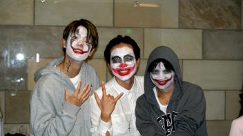 UC Davis International students pose in their Halloween costumes