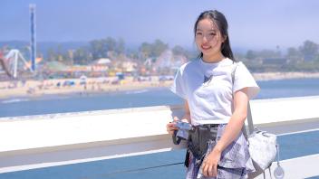 Yile Miao captures the breathtaking beauty of Santa Cruz Beach from the wharf with her camera in hand.