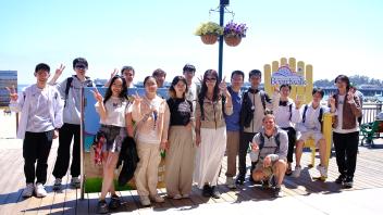 A group of GREAT Program students pose for a group photo at the Santa Cruz Beach Boardwalk