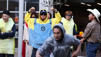 A group of UC Davis international students in costume pose during the annual Halloween Party.