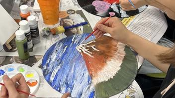 UC Davis international students paint old records