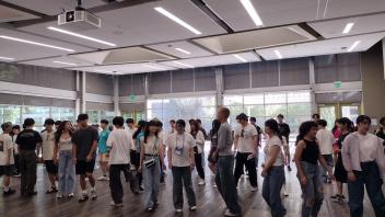 UC Davis international students get a dance lesson in the International Center