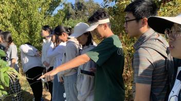 UC Davis international students at the UC Davis student farm