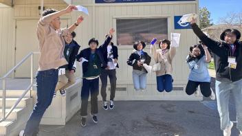 Seikei High School students jump high outside the UC Davis Men's Basketball Office