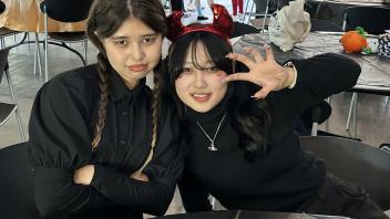 A group of UC Davis international students in costume pose during the annual Halloween Party.