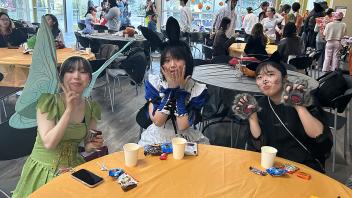 UC Davis international students pose in costume during the annual Halloween Party.