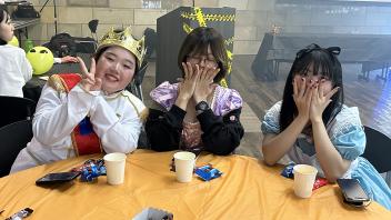 Students in costume at the International Center during the annual Halloween Party.