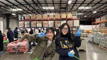 Seikei High School students pose while volunteering at the Sacramento Food Bank