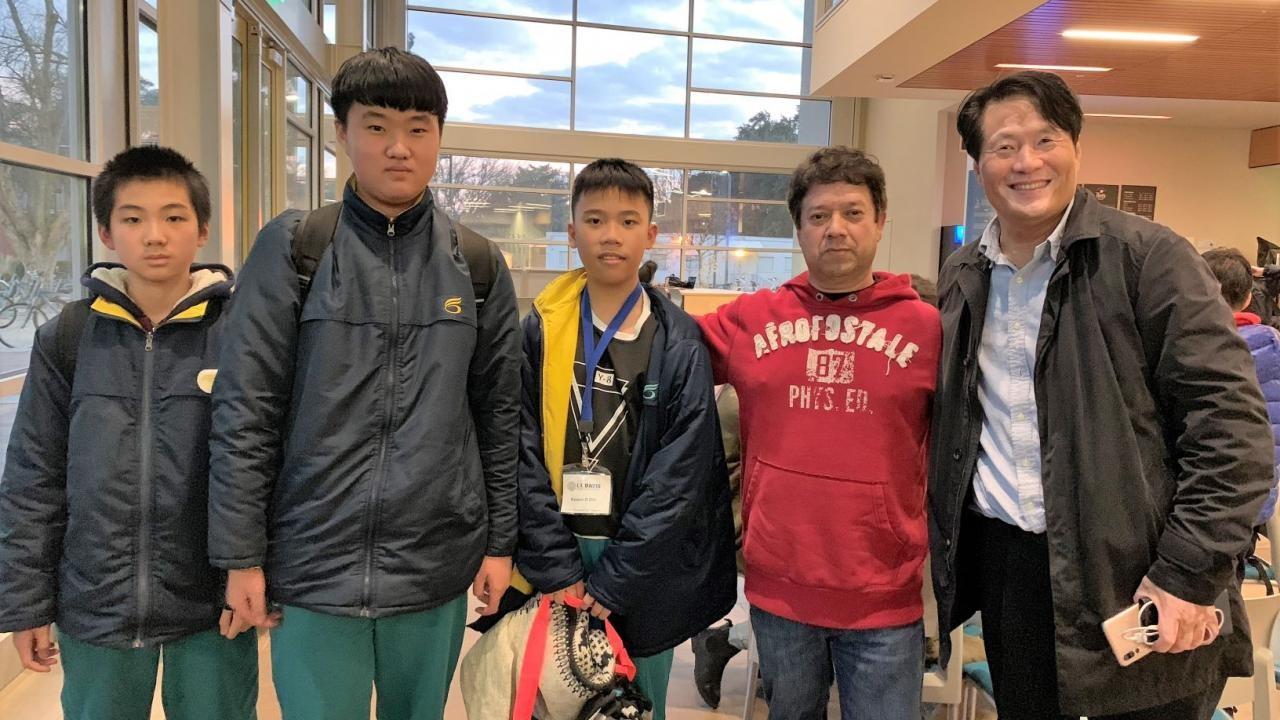 Visiting youth students from Guangzhou, China pose for a group photo at the International Center