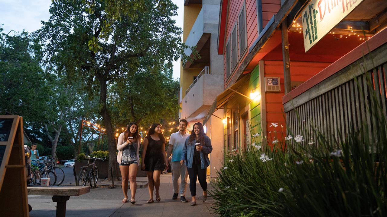 students walking through downtown Davis