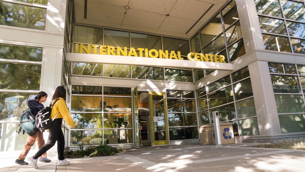 students walk into UC Davis International Center