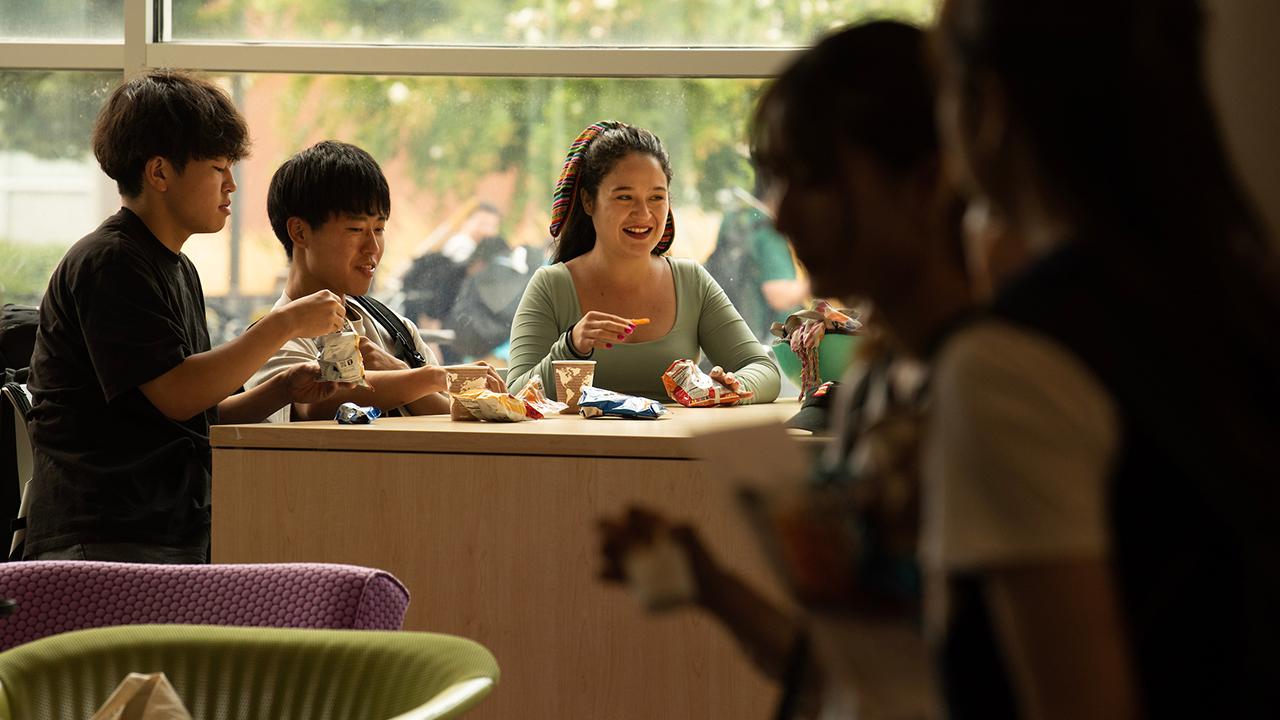 international students enjoy a snack in the UC Davis International Center