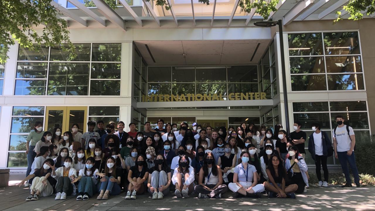 group photo of international students outside UC Davis International Center