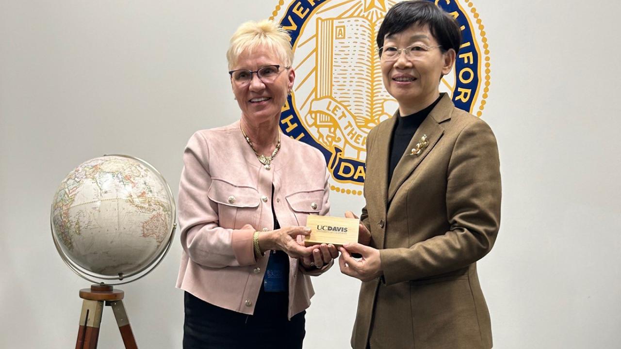 UC Davis International Programs Associate Dean Anneli Adams poses with a delegate member from Department of Ed Shandong Province