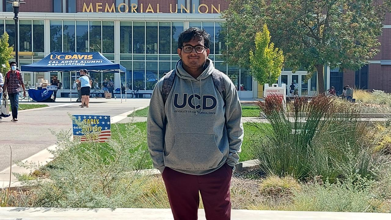 Global Study Program student Adhiraj Bhagawati poses in front of the Memorial Union at UC Davis