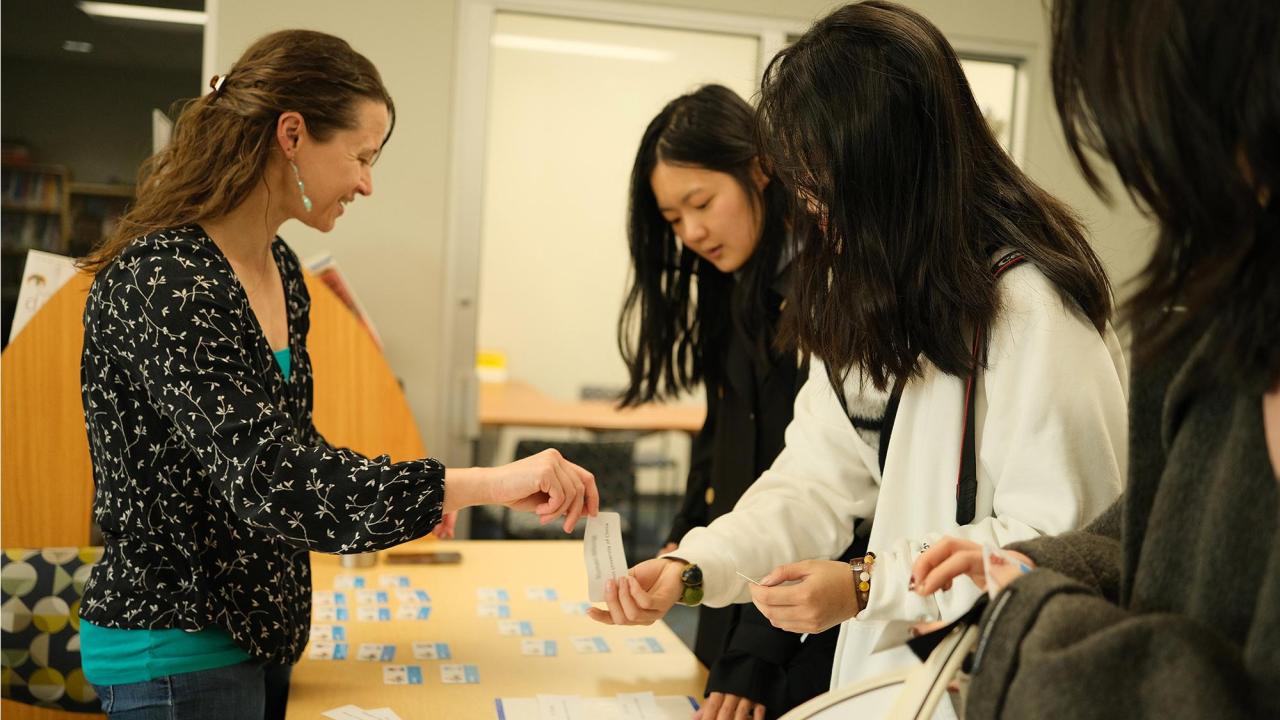 GSP students receive their Aggie Cards and welcome gifts during orientation.
