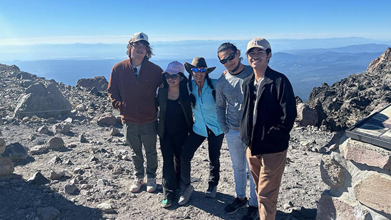Faiz with his host mom and friends hiking Mt. Lassen