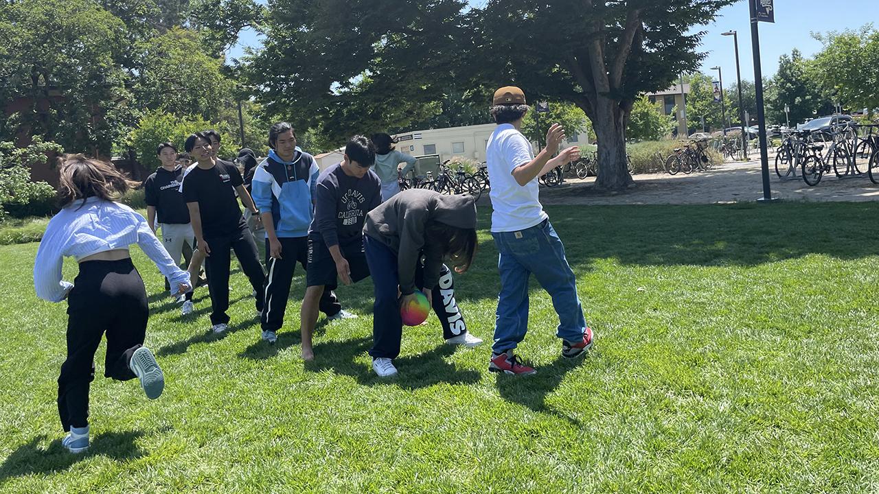 UC Davis international students play games on the International Center lawn during a field day event
