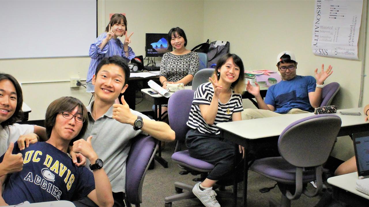 international students in the classroom pose for a photo