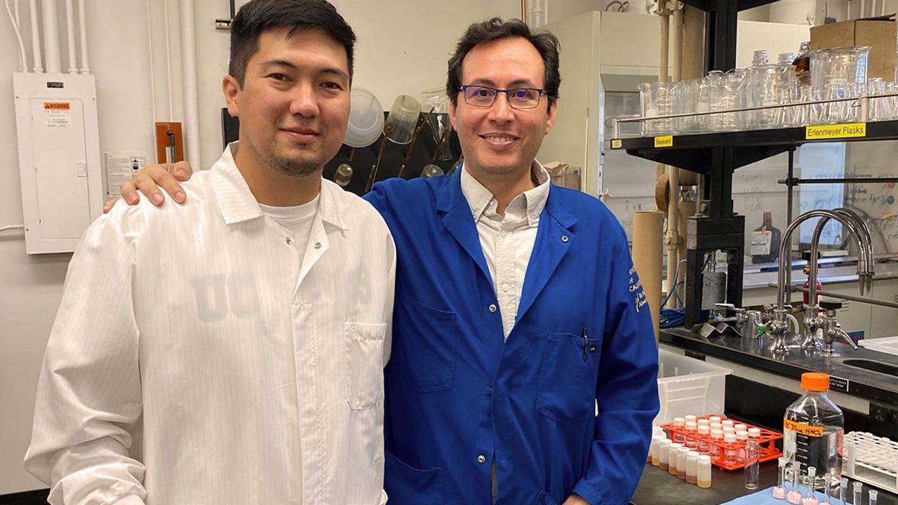 Zhankeldy Doszhanov (left) poses in the lab with TA Javier