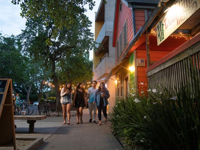 students walking through downtown Davis
