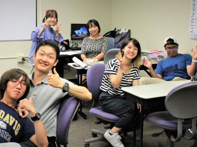 international students in the classroom pose for a photo
