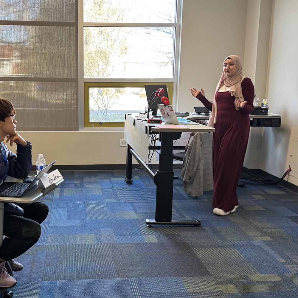 students listen to an instructor's lecture in the classroom