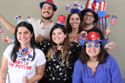 international students pose during an Independence Day party