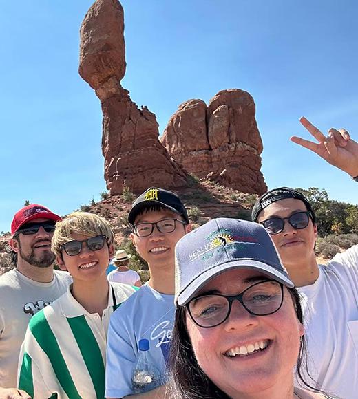 Chaplin and his host family take a selfie at Arches National Park