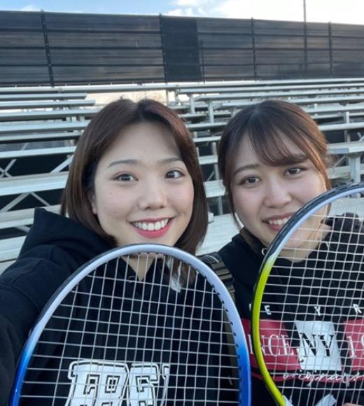 Minkyung Kim and friend with tennis rackets