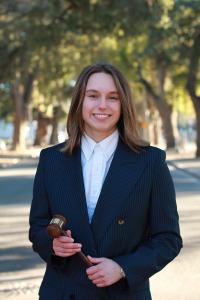 Kristin Mifsud, UC Davis Model UN president, poses with a gavel