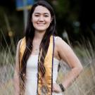 Anmerlyn Tucker poses in grad attire