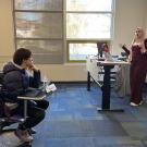 students listen to an instructor's lecture in the classroom