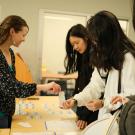 GSP students receive their Aggie Cards and welcome gifts during orientation.
