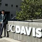 Global Study Program student Muhammad Faiz Satrio poses in front of the UC Davis sign