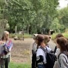 students from Japan visit Village Homes and a resident talks to them about the eco-conscious design